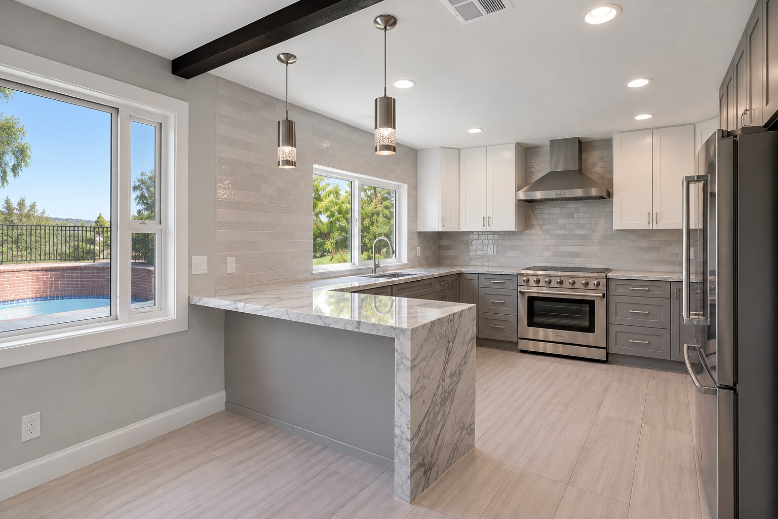 Modern kitchen with marble waterfall countertop